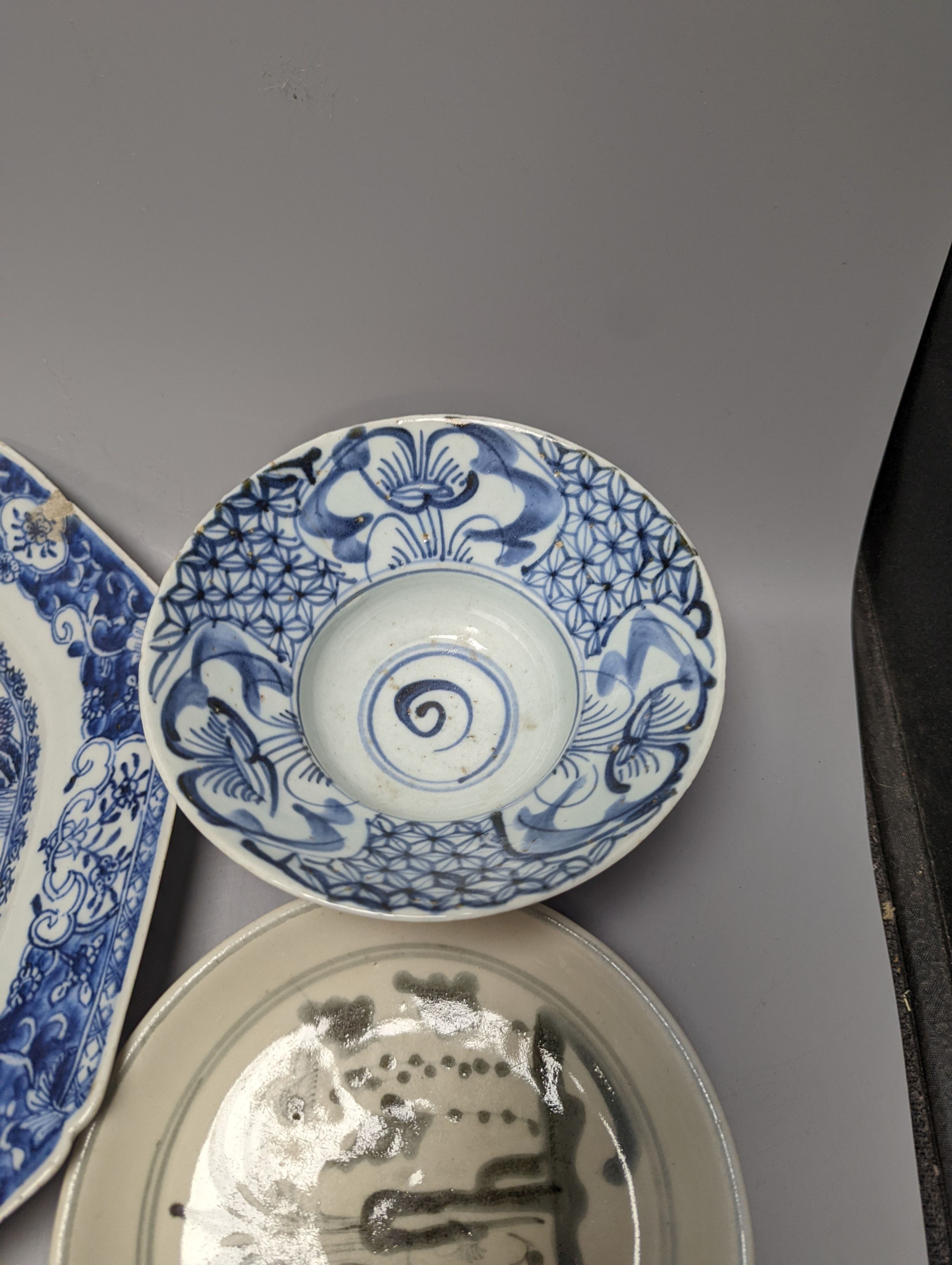 An 18th century Chinese export blue and white meat platter, 38 cms wide, and other Oriental tableware (6)